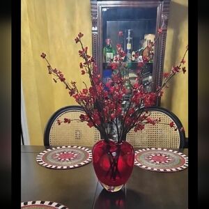 Elegant Red Glass Vase with Floral Arrangement